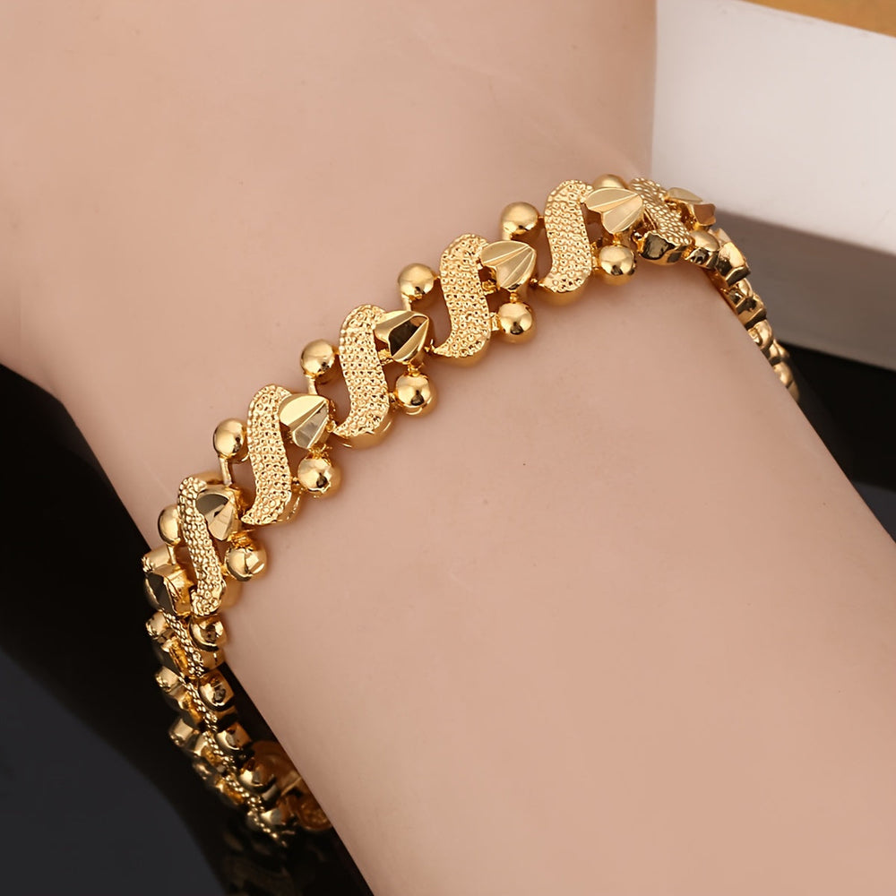 Lilia Ornate Wave Gold Bracelet