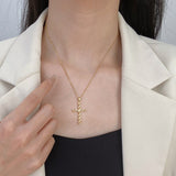 Radiant Twist Cross Gold Necklace