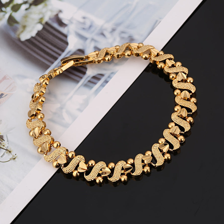 Lilia Ornate Wave Gold Bracelet