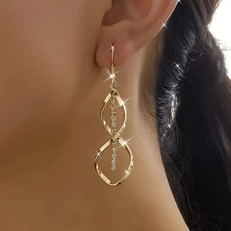 Solar Spiral Gold Earrings